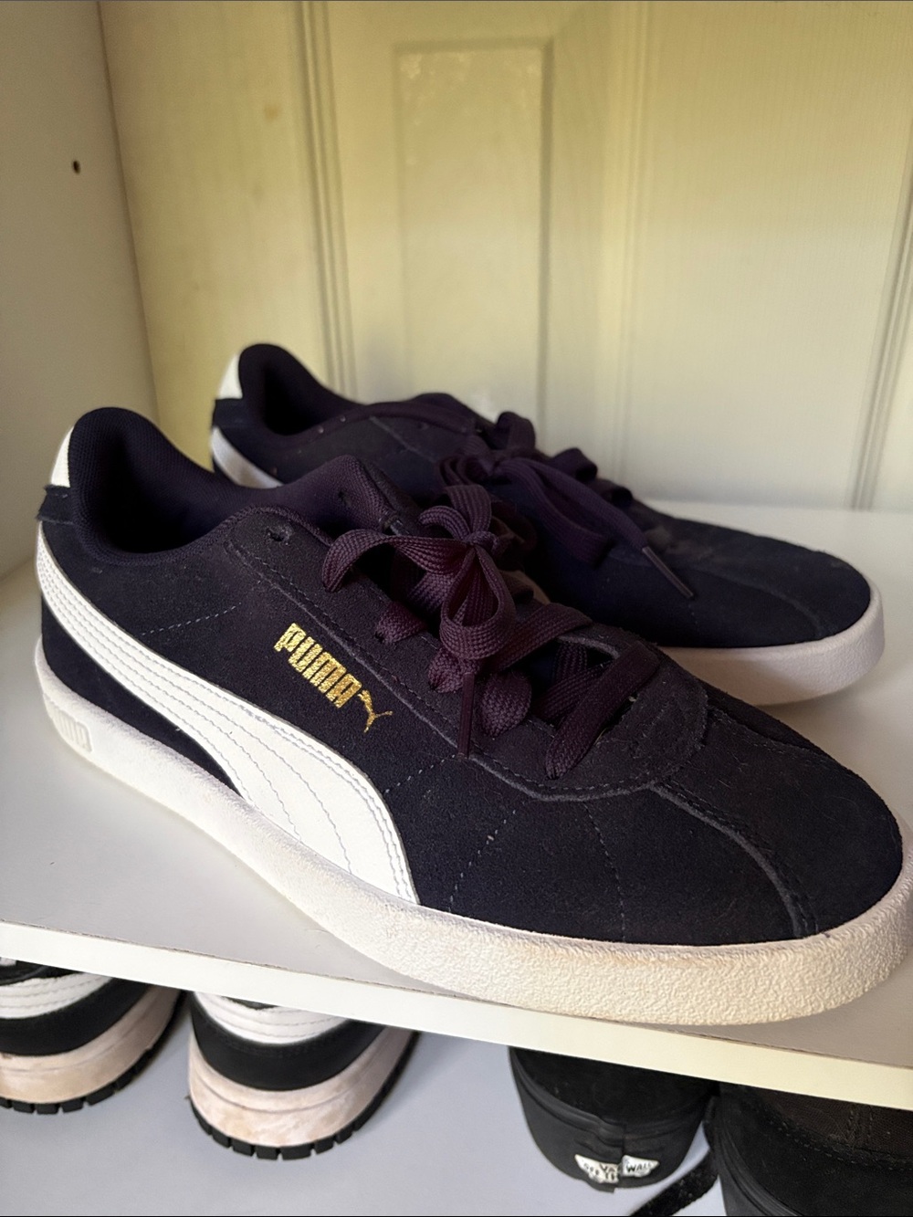 Puma Black Suede Sneakers with White Formstrip and Gold Logo